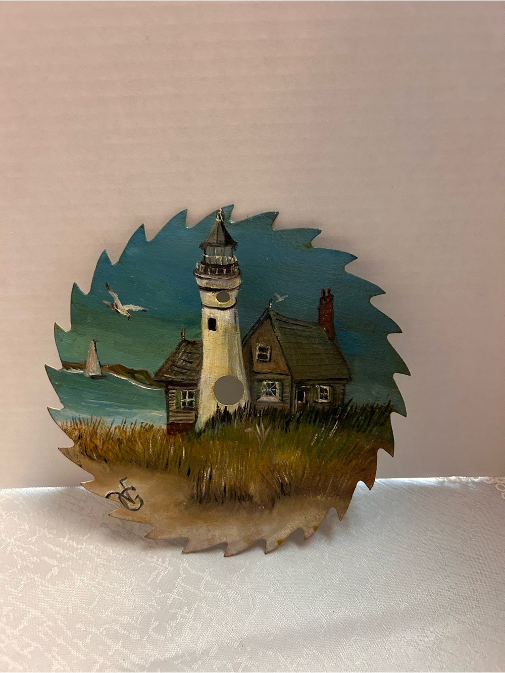 Vintage hand painted Coastal Lighthouse Seascape On Circular Saw Blade 7”
